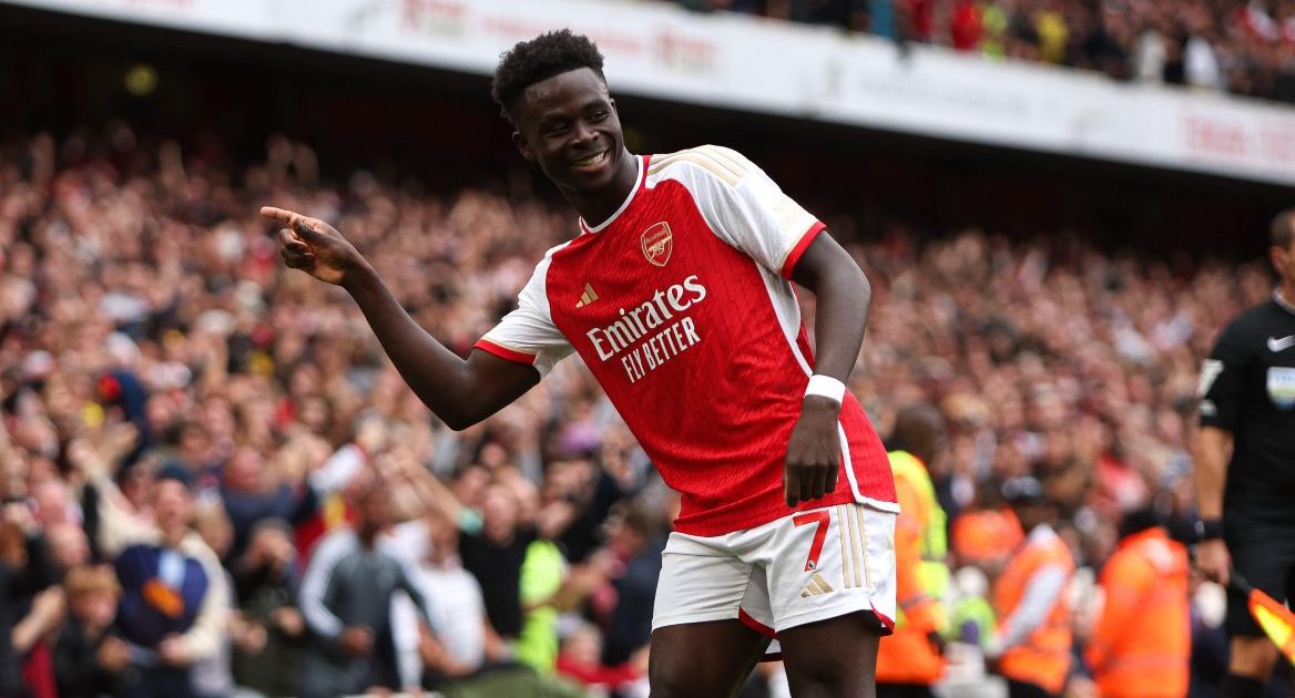 Bukayo Saka of Arsenal celebrates scoring their side's first goal of the game during the Premier League match at the Emirates Stadium, London.