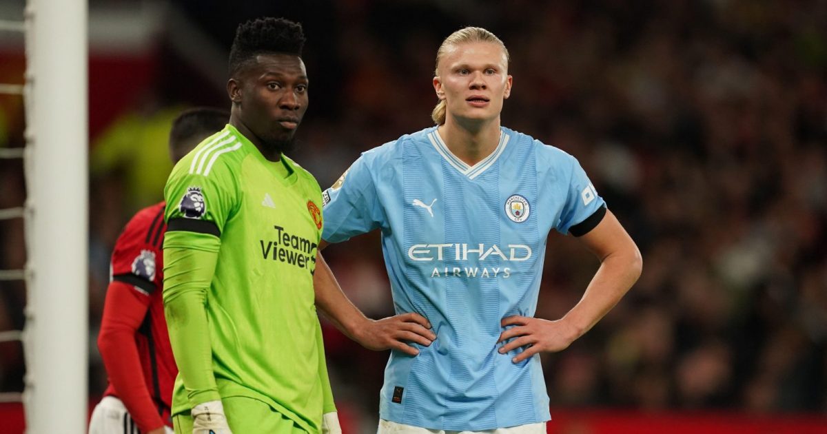 Erling Haaland waits next to Andre Onana.