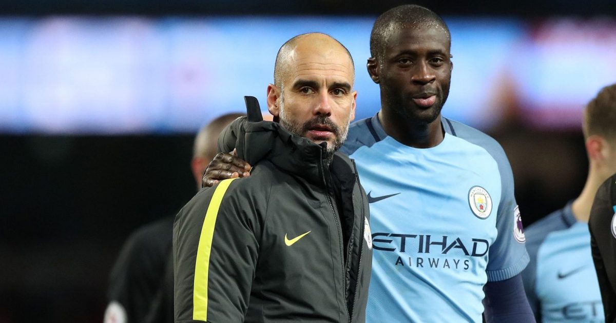 Manchester City Manager Pep Guardiola and Yaya Toure of Manchester City after the English Premier League match at Etihad Stadium, Manchester.