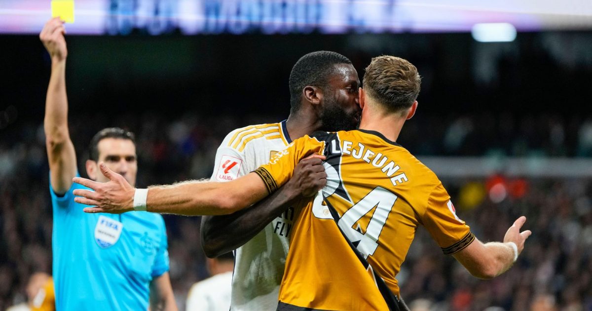 Real Madrid's Antonio Rudiger, center, argues with Rayo's Florian Lejeune during a Spanish La Liga soccer match between Real Madrid and Rayo Vallecano at the Santiago Bernabeu stadium in Madrid, Spain, Sunday, Nov. 5, 2023.