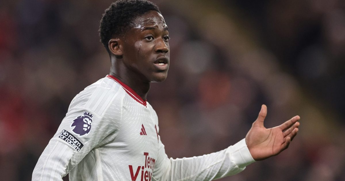 Manchester United's Kobbie Mainoo gestures to teammates away to Liverpool.