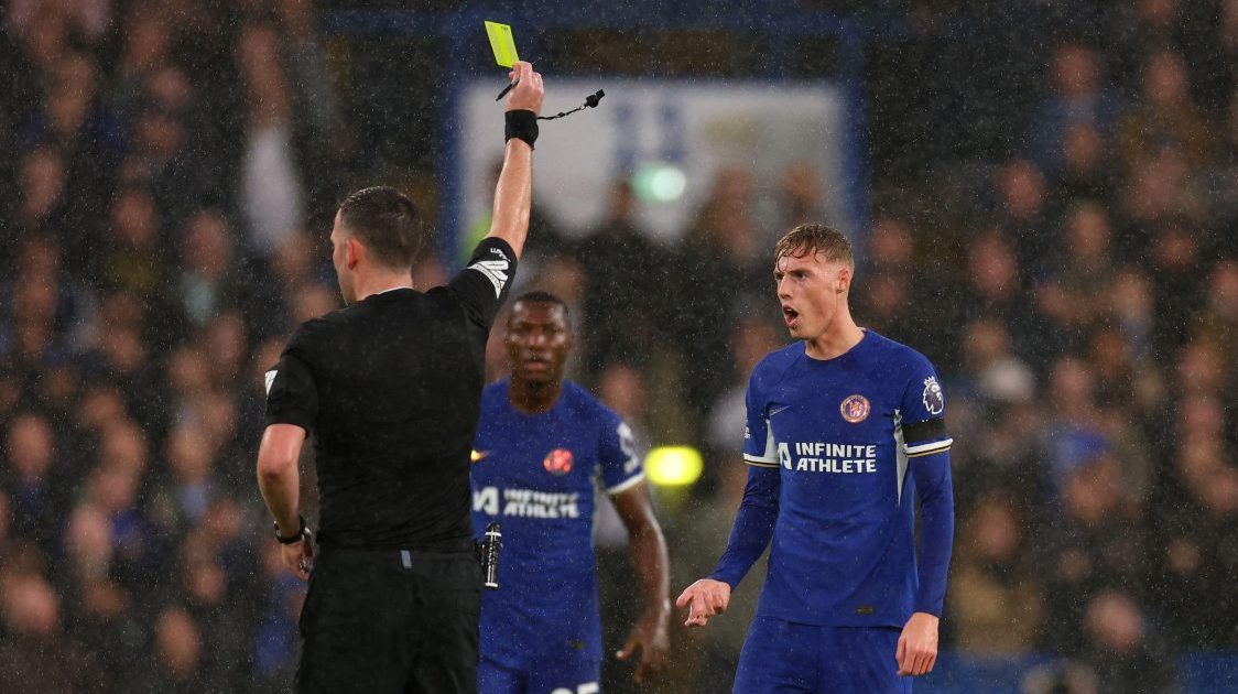 Cole Palmer of Chelsea is shown a yellow card
