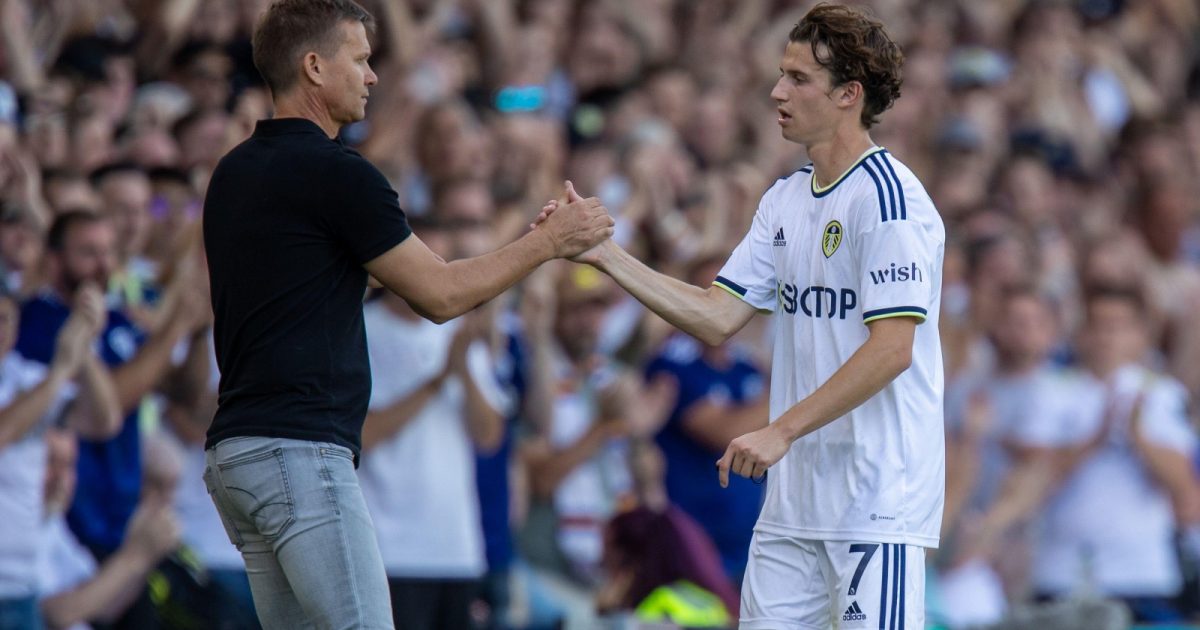 Brenden Aaronson #7 of Leeds United shakes hands with his manager Jesse Marsch as he comes off in the second half