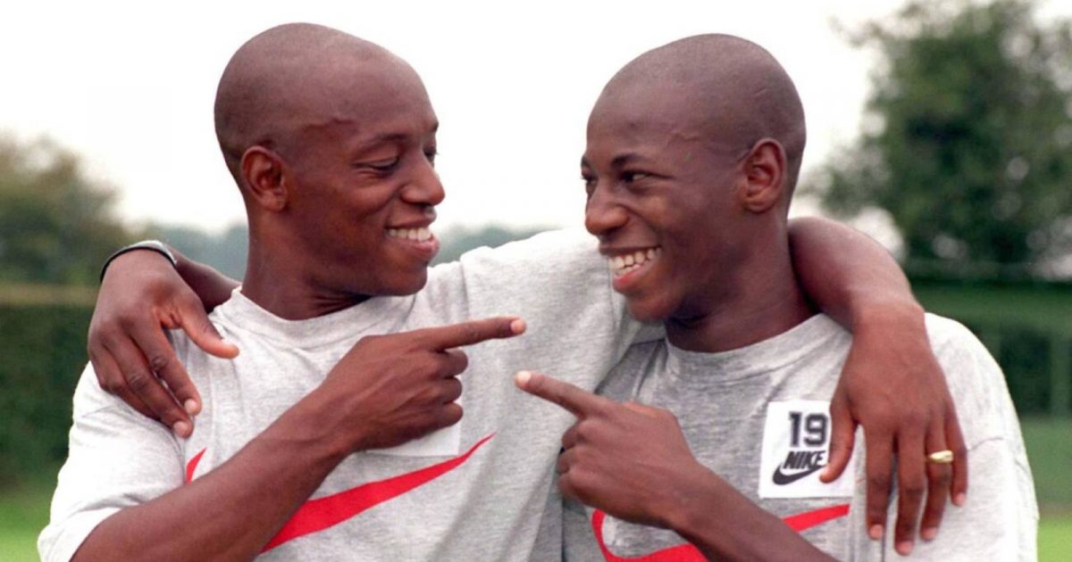 Guaranteed to cause confusion in the new season; Arsenal's Ian Wright (left) meets his double, new Portuguese signing Luis Boa Morte Pereira, during team training at London Colney, Hertfordshire, today (Thur)