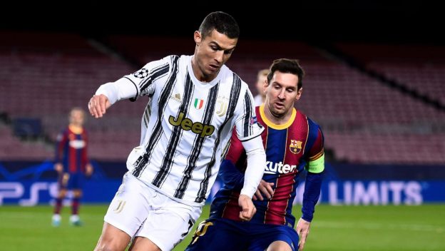 Barcelona, Spain - 08 December, 2020: Cristiano Ronaldo (L) of Juventus FC is challenged by Lionel Messi of FC Barcelona during the UEFA