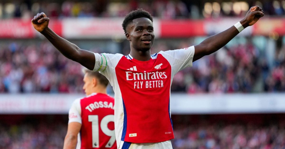 Arsenal's Bukayo Saka celebrates after scoring his side's third goal during the English Premier League soccer match between Arsenal and Southampton at the Emirates Stadium in London, Saturday, Oct. 5, 2024.