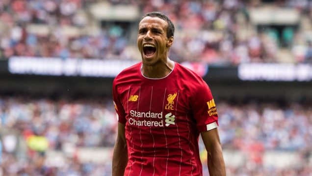 Joel Matip celebrates for Liverpool.