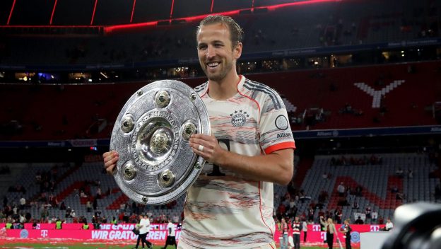 Bayern Munich striker Harry Kane with the Bundesliga trophy.