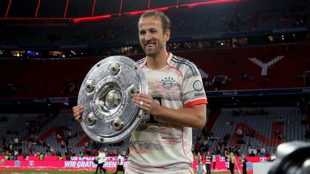 Bayern Munich striker Harry Kane with the Bundesliga trophy.