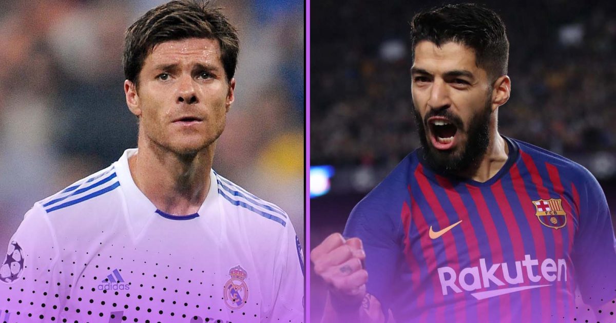 Xabi Alonso of Real Madrid and Luis Suarez of Barcelona