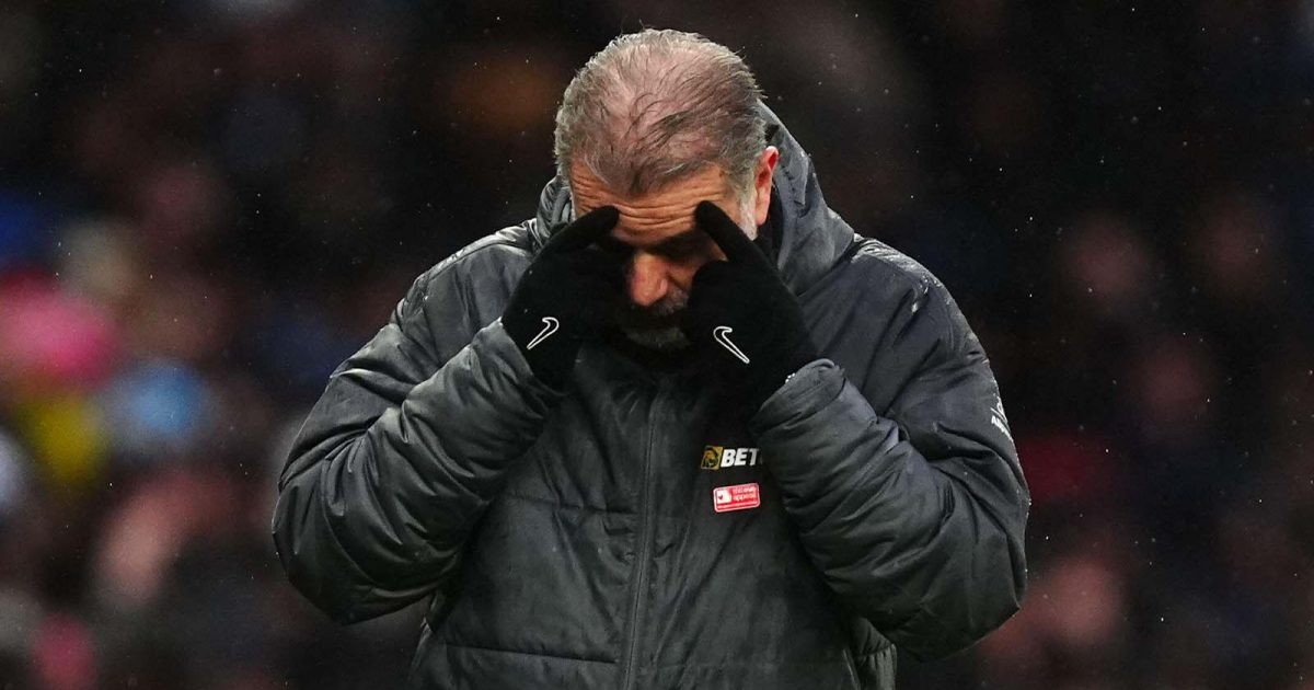 Tottenham Hotspur manager Ange Postecoglou with his head in his hands