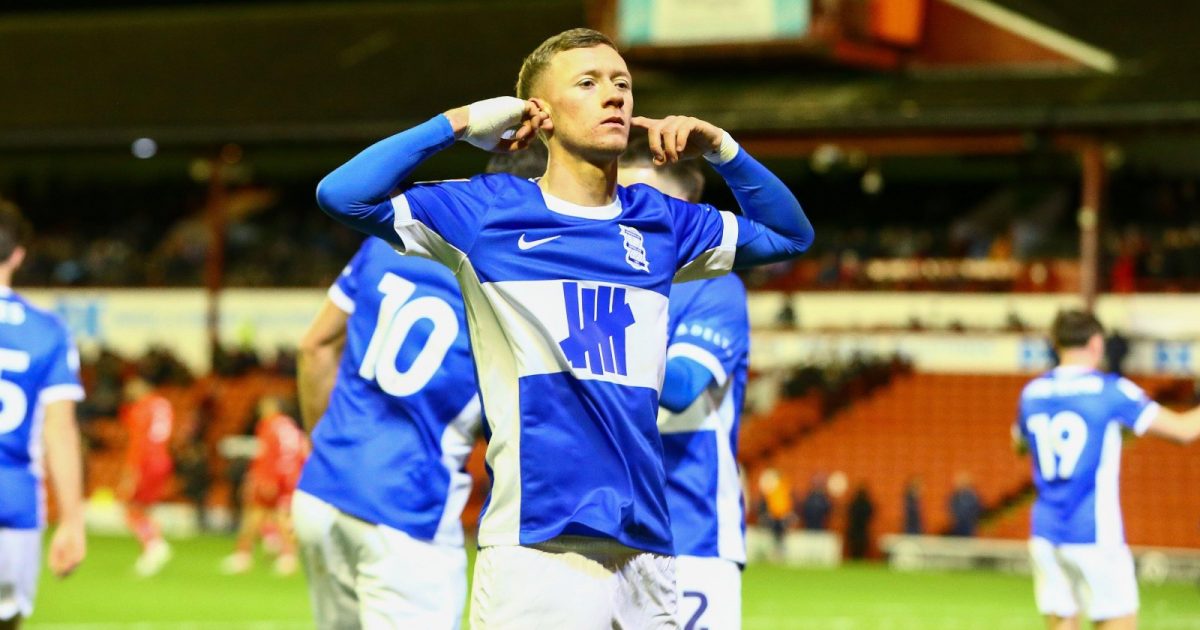 League One's record signing celebrates scoring in December 2024.