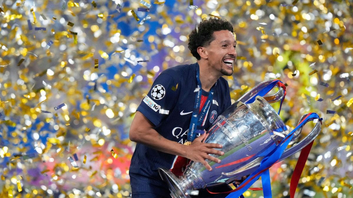 The captain of the 2025 Champions League winners with the trophy.