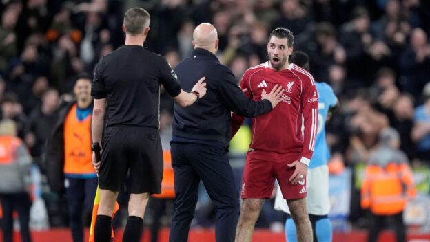 Dominik Szoboszlai protests his red card against Manchester City in February 2026.