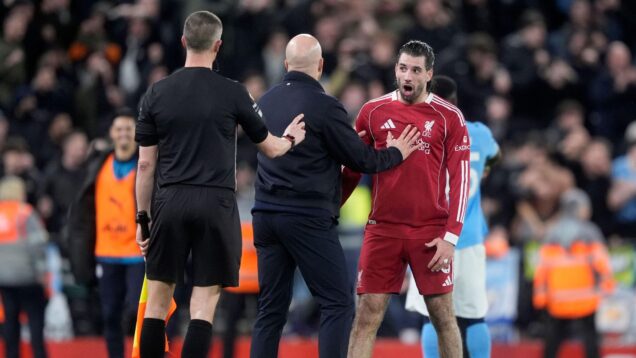 Dominik Szoboszlai protests his red card against Manchester City in February 2026.