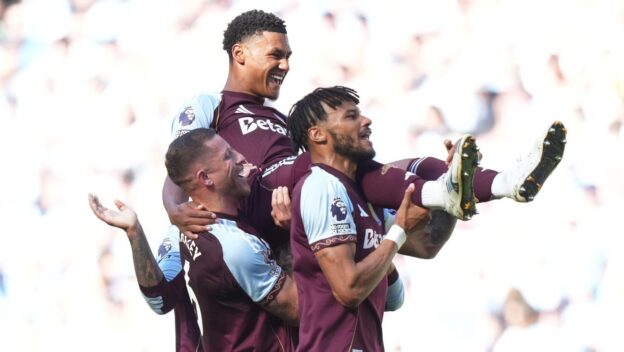 Team mates carry Aston Villa's Ollie Watkins after he scored during a Premier League soccer match between Manchester City and Aston Villa in Manchester, England, Sunday, May 24, 2026.