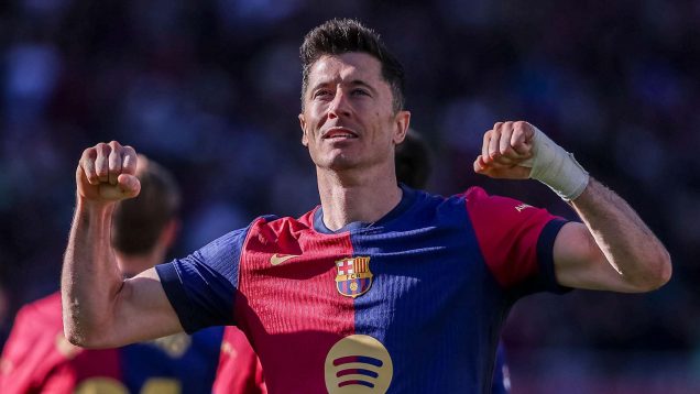 Robert Lewandowski celebrates scoring for Barcelona.