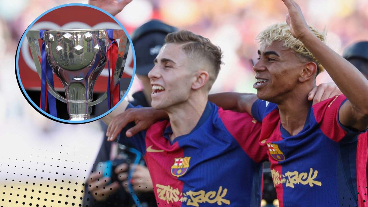 Barcelona's Lamine Yamal next to the La Liga trophy