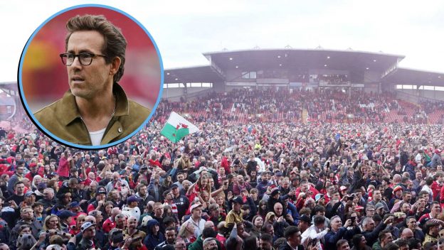 Wrexham home fans next to Ryan Reynolds