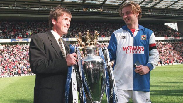 The captain of the 1995 Premier League title winners with the trophy.