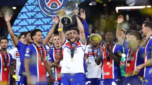 Salzburg, Austria. 12th Aug, 2026. Khvicha Kvaratskhelia of PSG raises the trophy with his teamates after the victory of the 2026 Super Cup Final football match between Paris Saint Germain and Aston Villa at Salzburg stadium in Salzburg (Austria), August 12th, 2026.