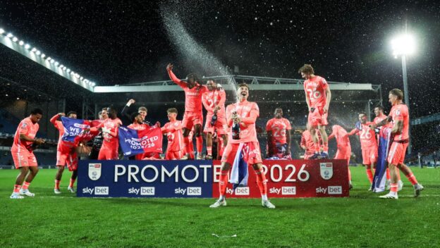 Coventry City players celebrate promotion in 2026.