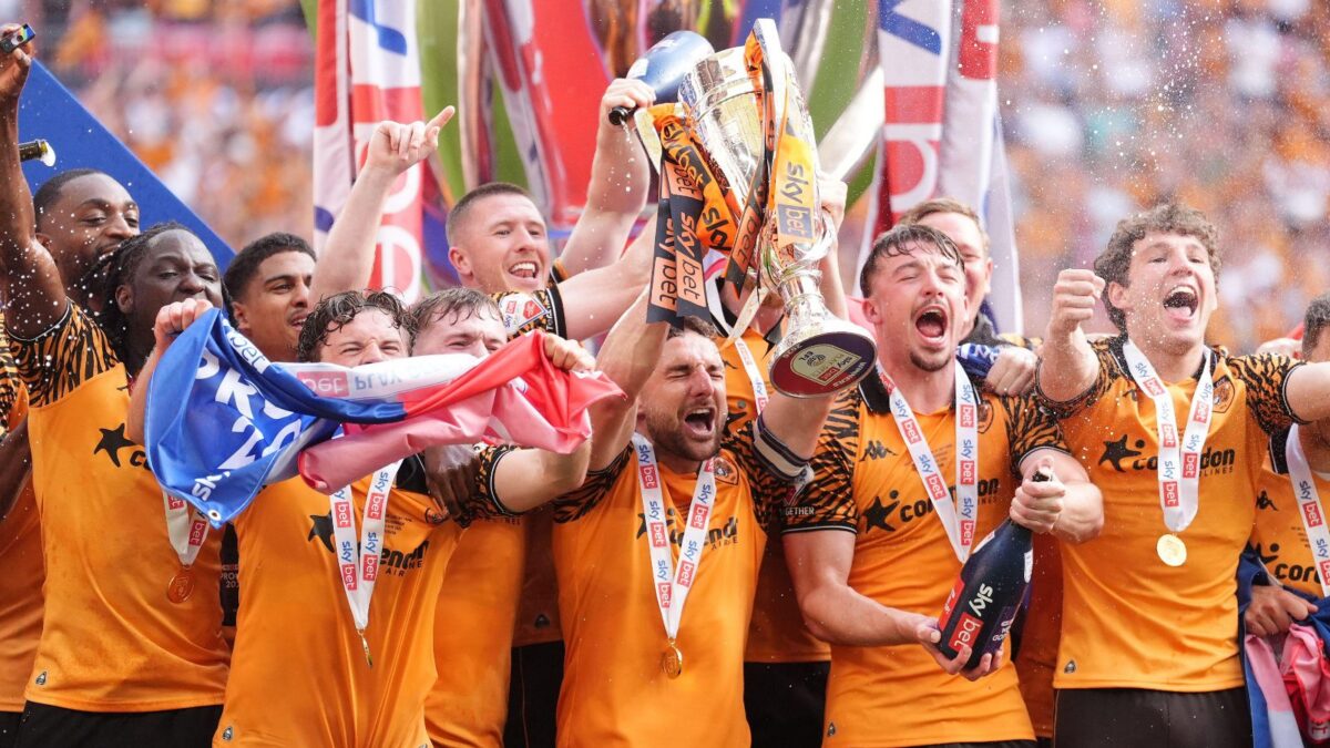 Hull City players celebrate their promotion to the Premier League in 2026.