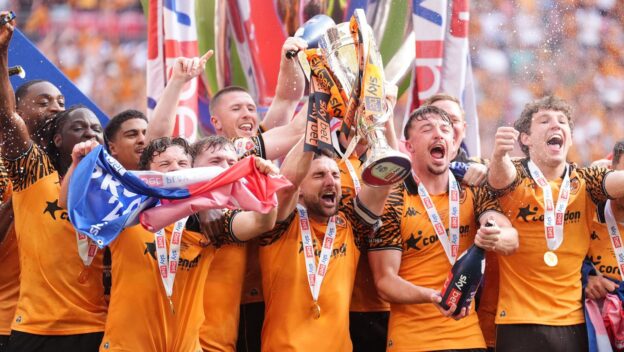 Hull City players celebrate their promotion to the Premier League in 2026.