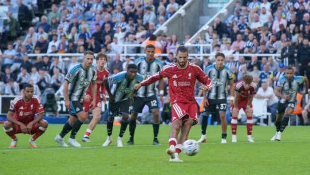 Dominik Szoboszlai crashes home his penalty against Newcastle, August 2026.