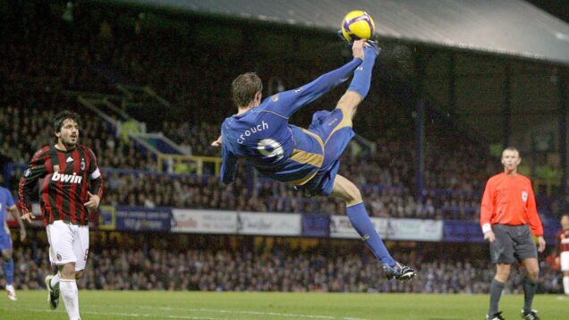 Peter Crouch attempts an overhead kick against Milan.