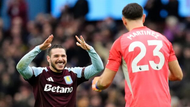 Aston Villa's Emi Buendia celebrates with goalkeeper Emiliano Martinez after the final whistle following the Premier League match at Villa ParkBirmingham. Picture date: Saturday December 62025.