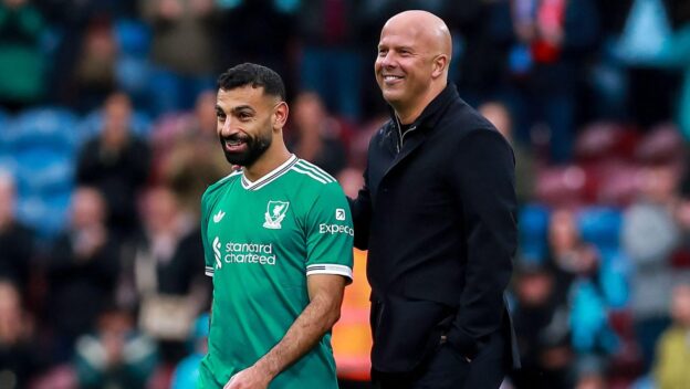 Burnley, UK. 14th Sep, 2025. Liverpool manager Arne Slot celebrates with Mohamed Salah of Liverpool during the Burnley FC v Liverpool FC English Premier League match at Turf Moor, Burnley, England, United Kingdom on 14 September 2025