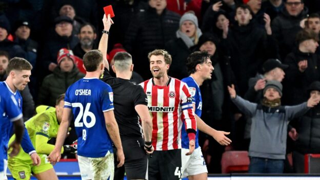Referee Tom Nield shows a red card to Sheffield United's Patrick Bamford during the Sky Bet Championship match at Bramall Lane, Sheffield. Picture date: Saturday January 24, 2026.