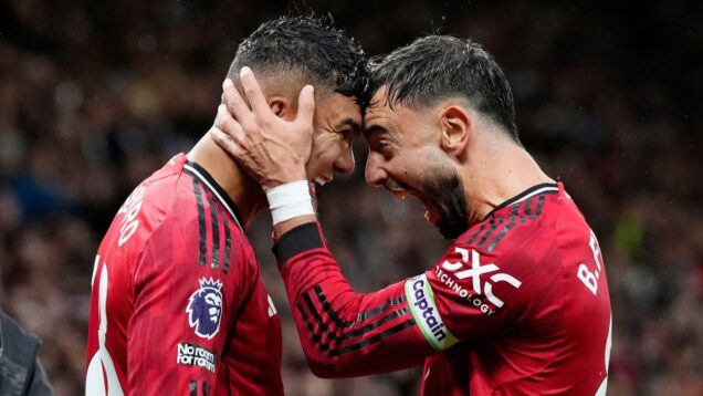 Manchester United's Casemiro (left) celebrates with Bruno Fernandes after scoring his sides second goal during the Premier League match at Old Trafford, Manchester. Picture date: Saturday September 20, 2025.