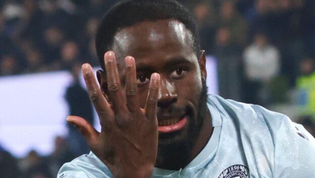 Udinese forward Keinan Davis celebrates