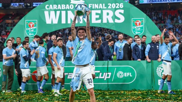 Nico O'Reilly of Manchester City lifts the trophy after the Arsenal v Manchester City Carabao Cup Final match at Wembley Stadium, London, England on 22 March 2026