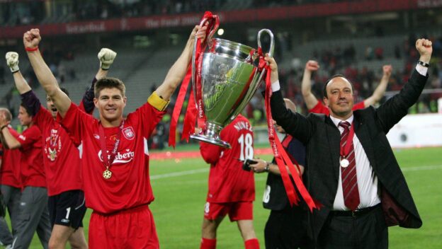 Liverpool's captain Steven Gerrard, left, and coach Rafael Benitez hold the trophy aloft after the UEFA Champions League Final between AC Milan and Liverpool at the Ataturk Olympic Stadium in Turkey, Istanbul Wednesday May 25, 2005.
