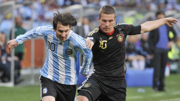 Lionel Messi of Argentina (L) vies with Lukas Podolski of Germany during the FIFA World Cup 2010 quarterfinal match between Argentina and Germany at the Green Point Stadium in Cape Town, South Africa 03 July 2010.