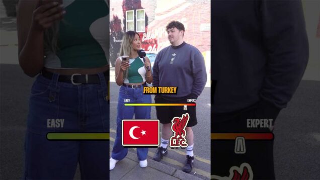 Liverpool fan being interviewed outside Anfield