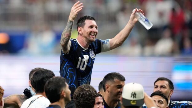 Lionel Messi celebrating with Argentina