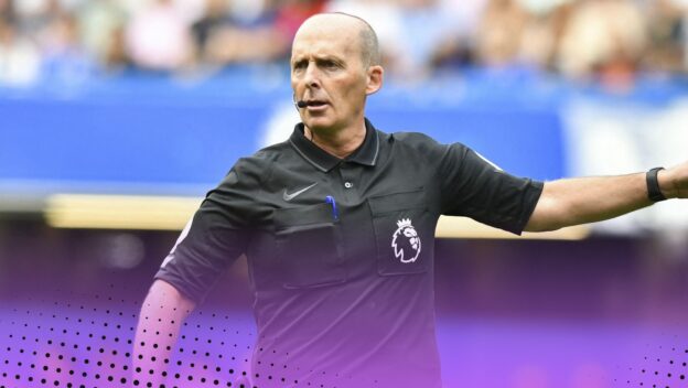 Mike Dean refereeing a Premier League game