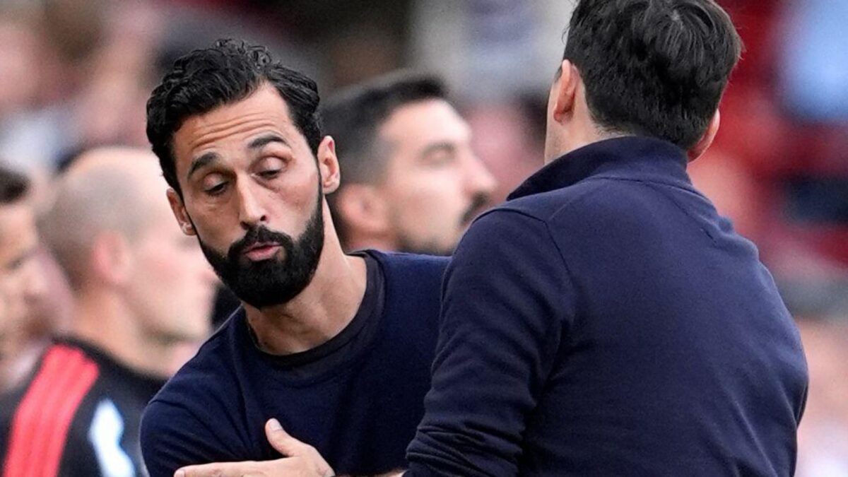 Fulham manager Alvaro Arbeloa bumps into Liverpool coach Andoni Iraola