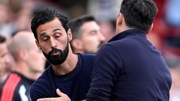 Fulham manager Alvaro Arbeloa bumps into Liverpool coach Andoni Iraola