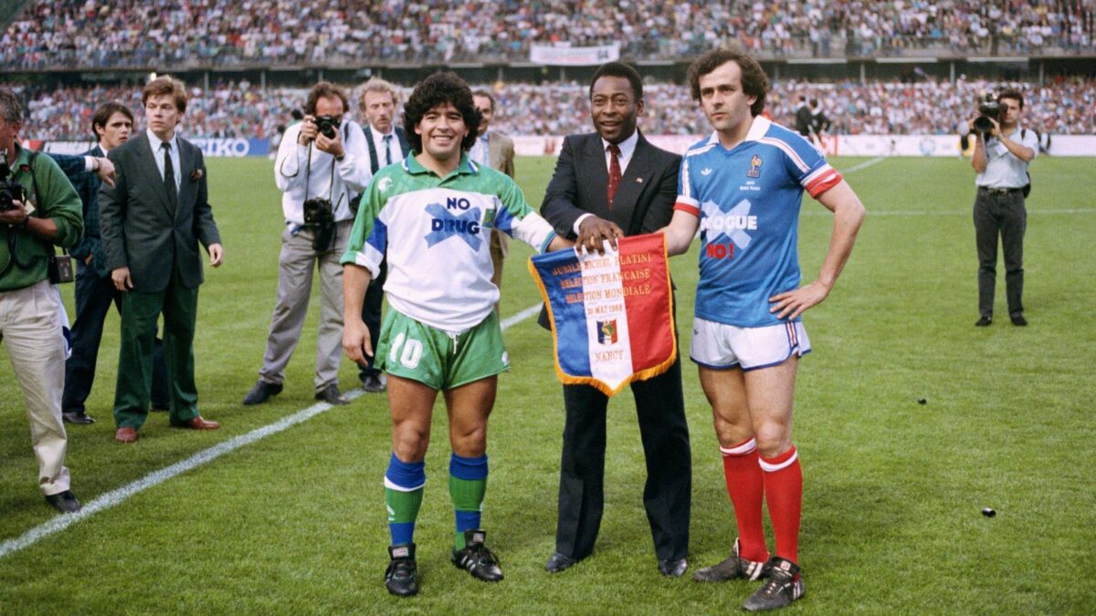 Soccer stars Argentineâ€™s Diego Maradona, left, Pele of Brazil, center, and Franceâ€™s Michel Platini pose shaking hands during Platiniâ€™s jubilee at Nancy stadium, Eastern France, Monday, May 23, 1988 as they celebrate Platiniâ€™s one-year-old retirement in a match opposing a selection of international soccer stars to Franceâ€™s best players.