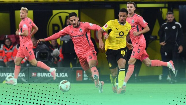 Dortmund's Ethan Nwaneri, right, and Bremen's Ludovit Reis vie for the ball during the German Bundesliga soccer match between Borussia Dortmund and Werder Bremen in Dortmund, Germany, Friday, Oct. 9, 2026.